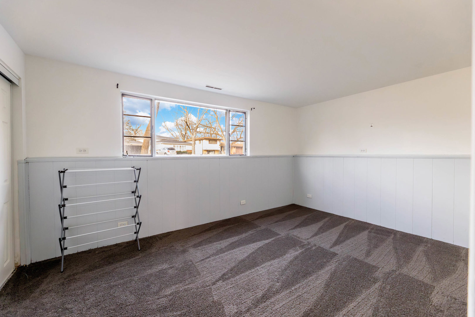 313 Jackson Street Park Forest, IL 60466 - Photo 17 of 22 a view of an empty room with a window