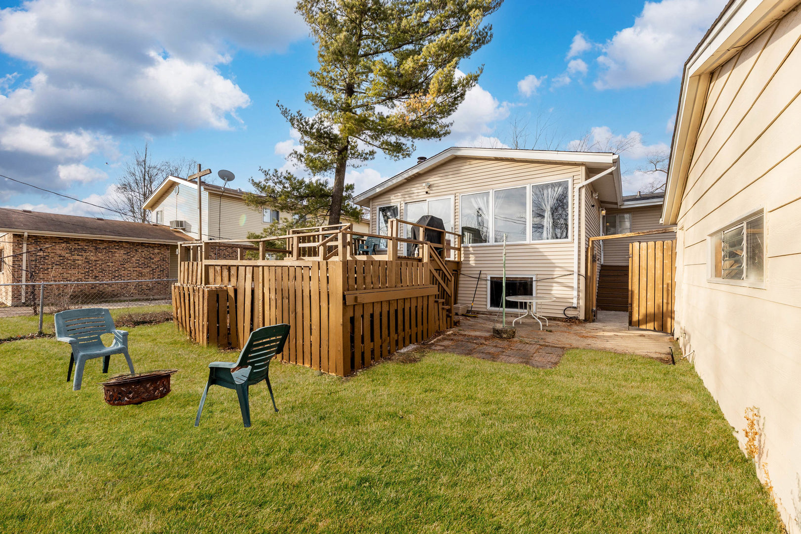 313 Jackson Street Park Forest, IL 60466 - Photo 21 of 22 a view of a house with back yard