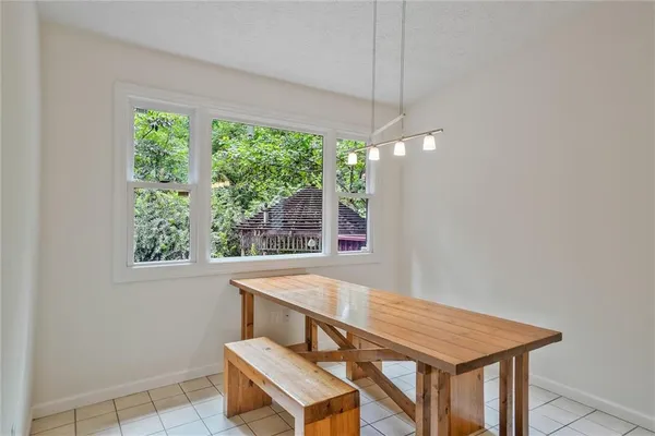 a view of a chairs and tables in patio