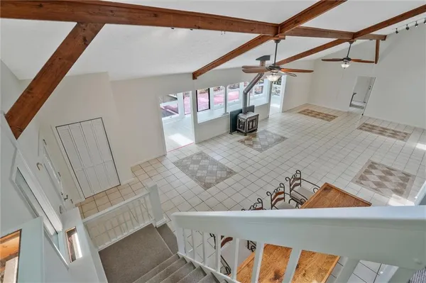 a view of entryway and kitchen