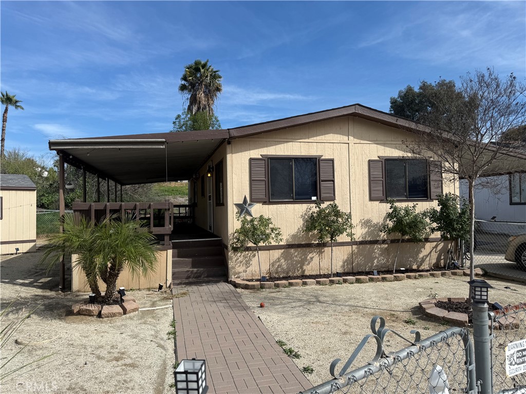 15181 Van Buren Riverside, CA 92504 - Photo 2 of 21 a front view of a house having patio