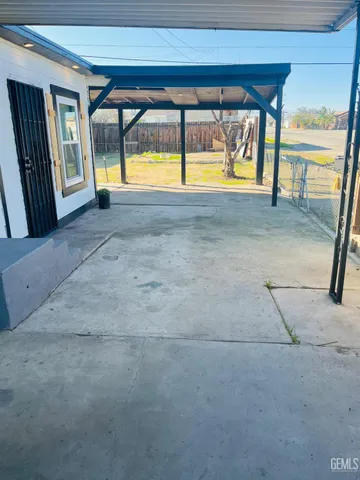 a view of spacious bathroom with a tub
