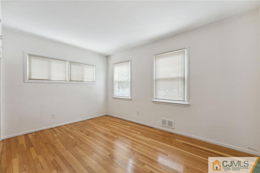 8 Longfellow Drive Colonia, NJ 07067 - Photo 18 of 25 a view of empty room with window