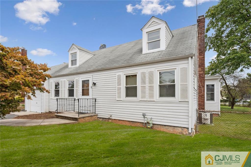 8 Longfellow Drive Colonia, NJ 07067 - Photo 25 of 25 a front view of a house with a yard