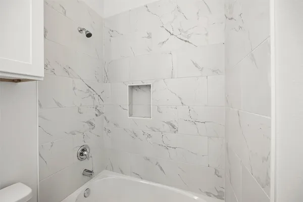 a bathroom with a bathtub