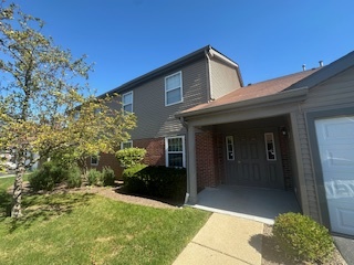 717 East Whispering Oaks Drive, Unit 2RR Palatine, IL 60074 - Photo 11 of 11 a view of a house with a yard