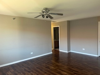 717 East Whispering Oaks Drive, Unit 2RR Palatine, IL 60074 - Photo 3 of 11 a view of an empty room with a window