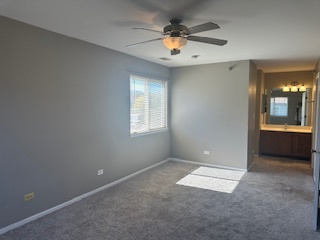 717 East Whispering Oaks Drive, Unit 2RR Palatine, IL 60074 - Photo 6 of 11 an empty room with a empty space and windows