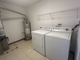717 East Whispering Oaks Drive, Unit 2RR Palatine, IL 60074 - Photo 10 of 11 a utility room with dryer and washer