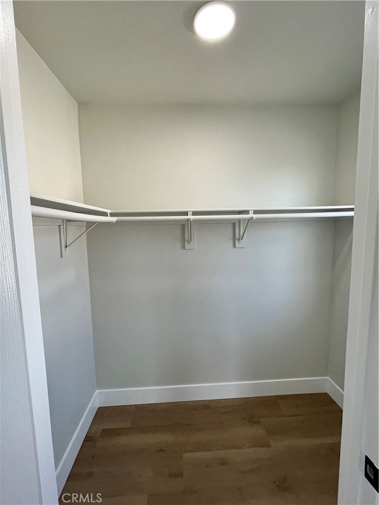 1004 South Riverside Avenue, Unit C1 Rialto, CA 92376 - Photo 19 of 19 a view of a room with wooden floor