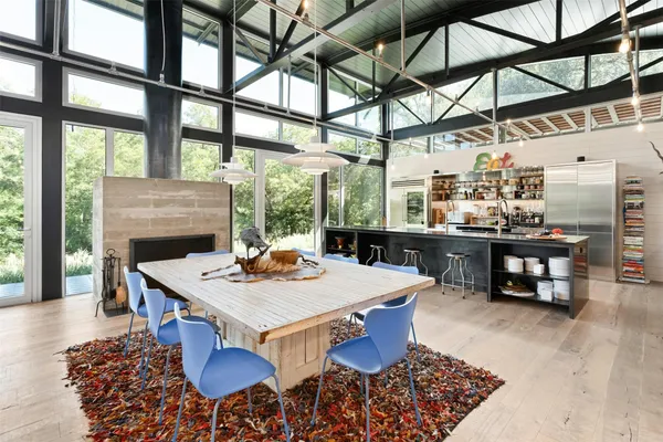 a view of a dining room with furniture window and outside view