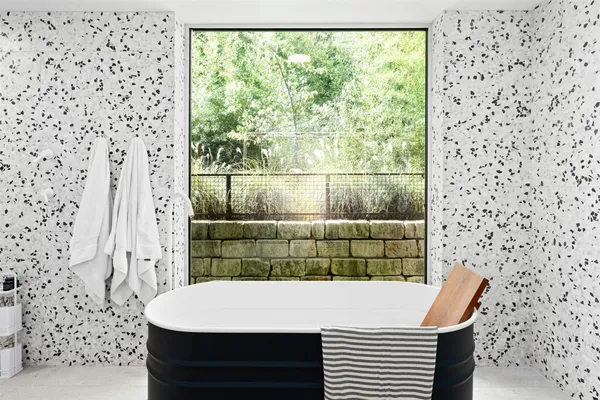 a bed room with a bed and a television