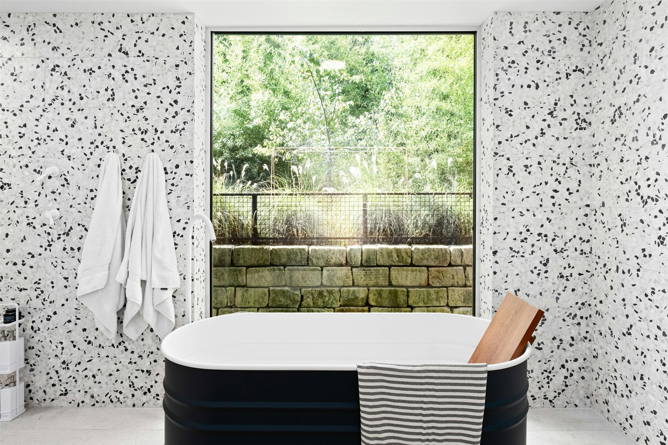 2212 River Hills Road Austin, TX 78733 - Photo 20 of 40 a bathroom with a shower and a sink