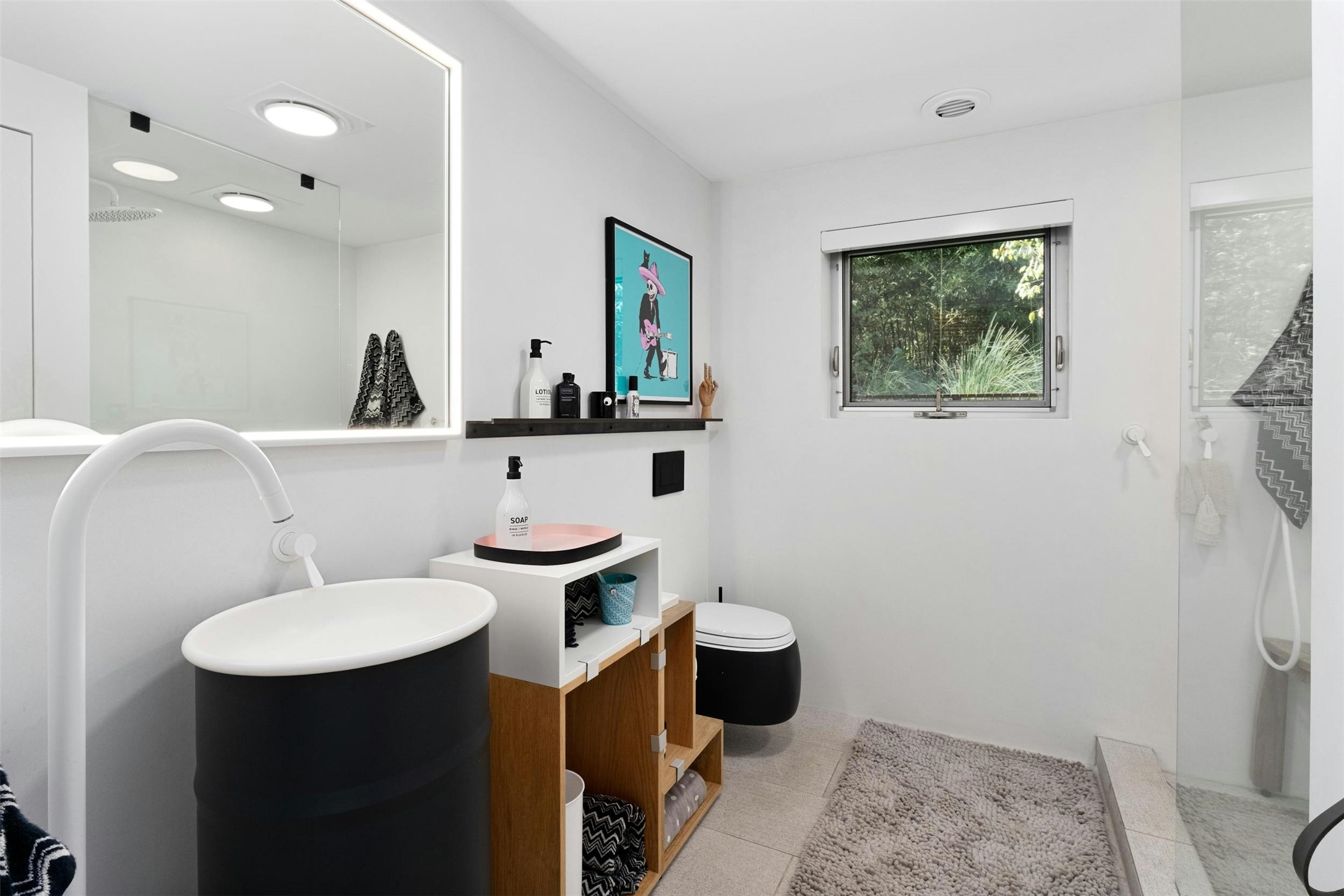 2212 River Hills Road Austin, TX 78733 - Photo 24 of 40 a bathroom with a toilet sink and mirror