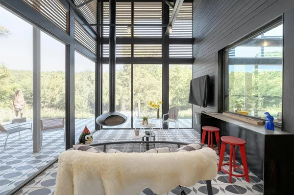 a view of swimming pool with a bench in front of it