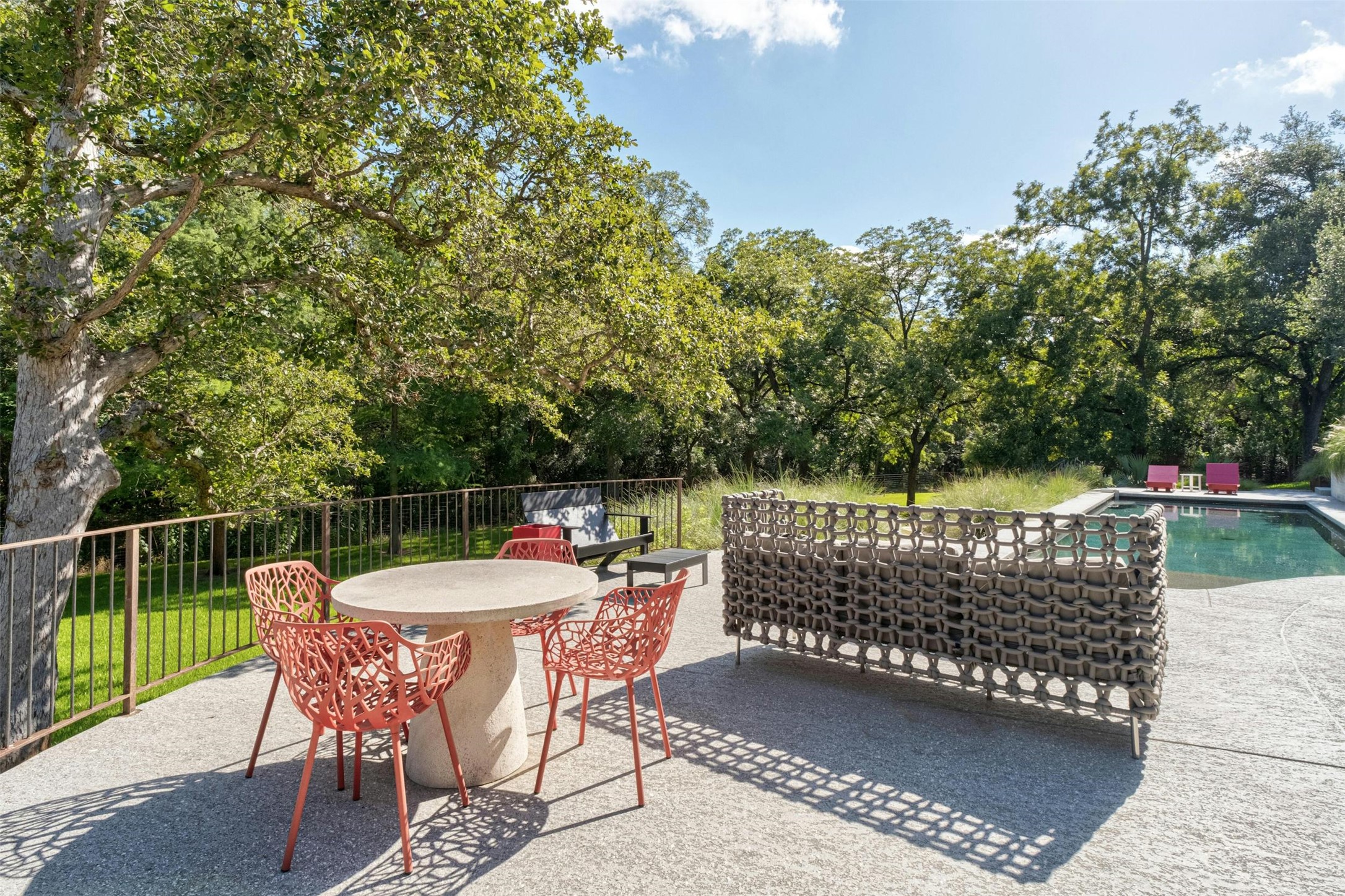 2212 River Hills Road Austin, TX 78733 - Photo 28 of 40 a wooden bench sitting in a roof deck