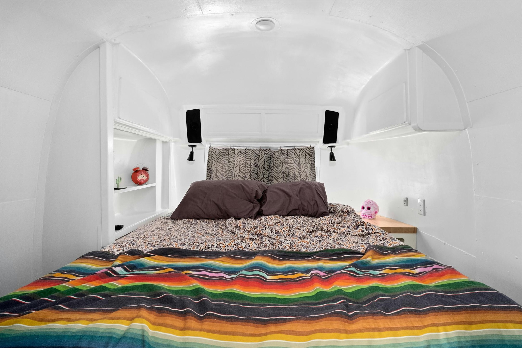 2212 River Hills Road Austin, TX 78733 - Photo 37 of 40 a bedroom with a bed and a painting on the wall