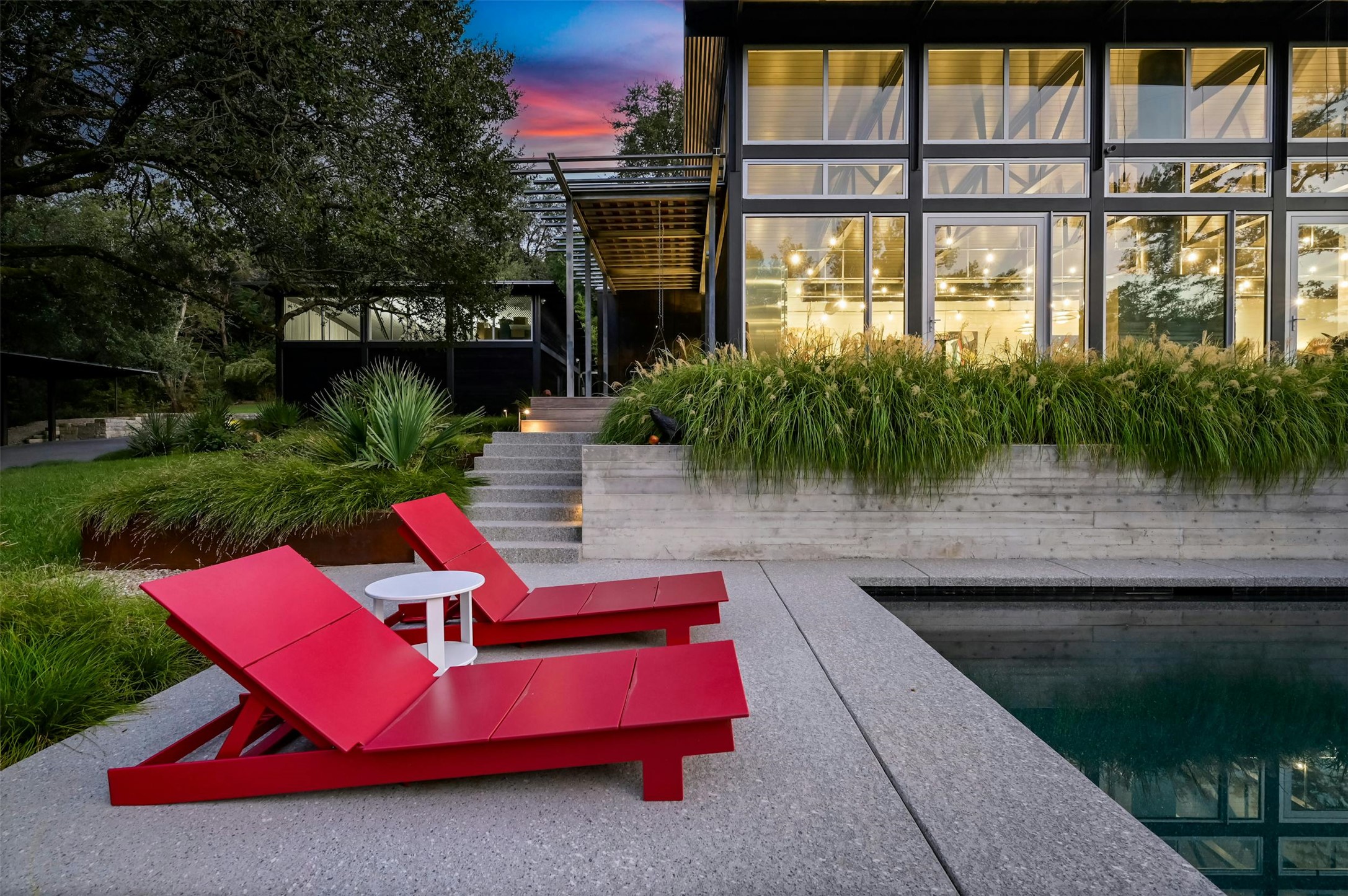 2212 River Hills Road Austin, TX 78733 - Photo 39 of 40 a backyard of a house with yard and outdoor seating
