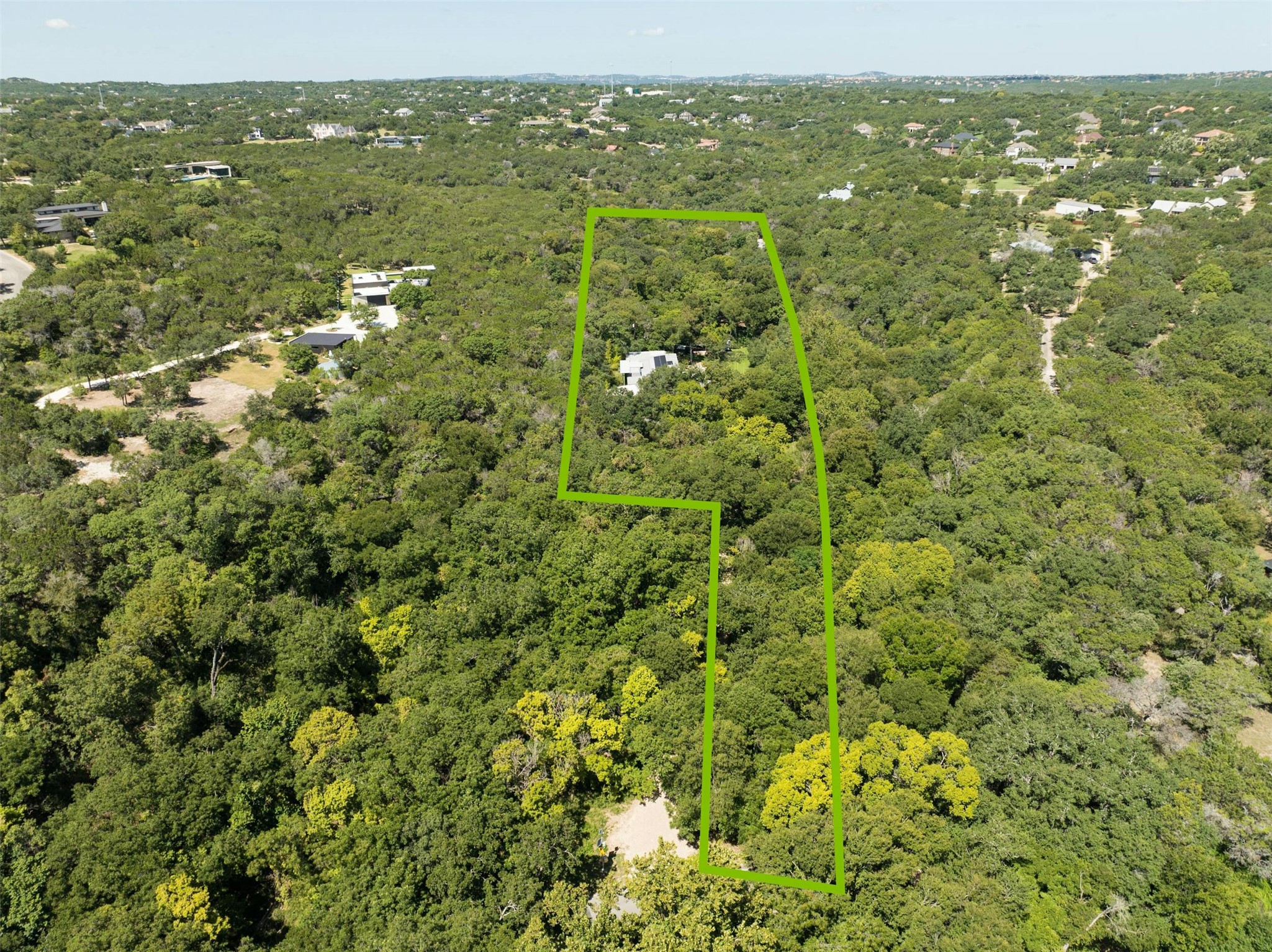 2212 River Hills Road Austin, TX 78733 - Photo 40 of 40 a view of a green field with lots of trees