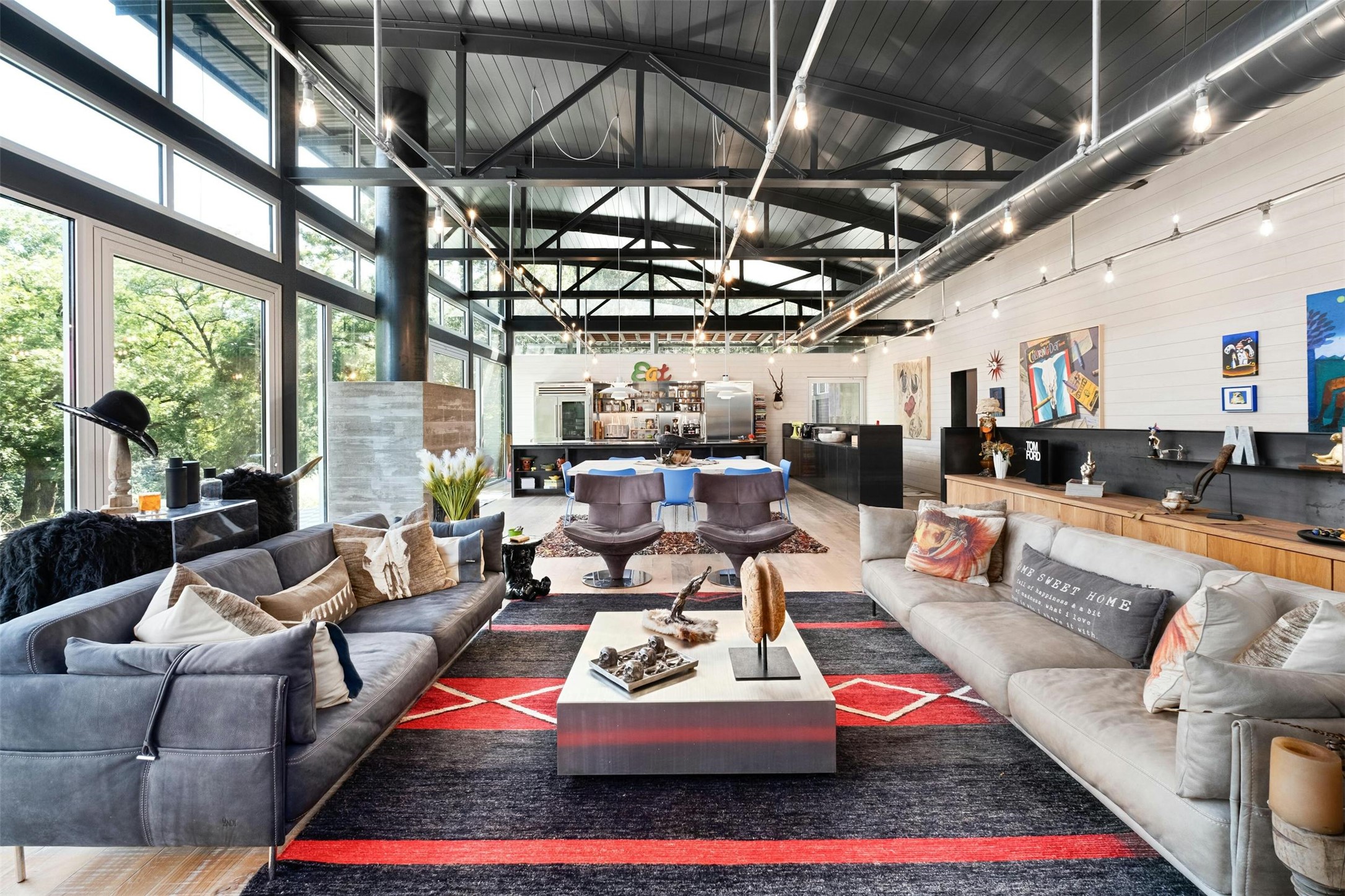 2212 River Hills Road Austin, TX 78733 - Photo 8 of 40 a living room with furniture fireplace and a table