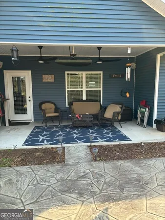 a front view of a house with patio