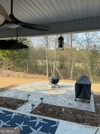 a view of swimming pool with a yard