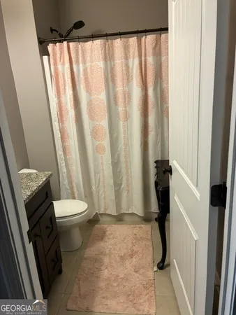 a bathroom with a bath tub