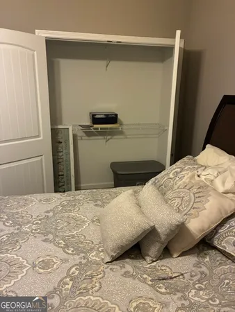 a kitchen with a sink and a potted plant
