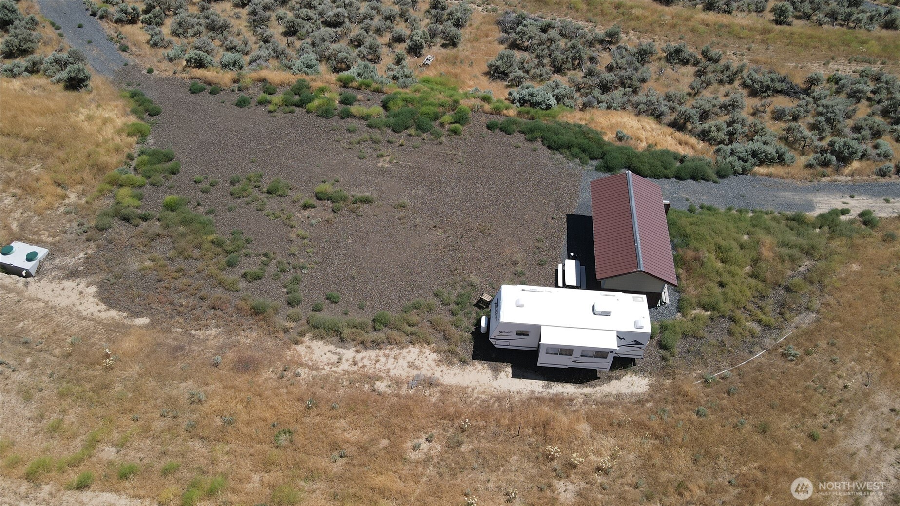 41 Banks Lake View Road, Unit 99115 Coulee City, WA 99115 - Photo 13 of 20 an aerial view of a house with a yard