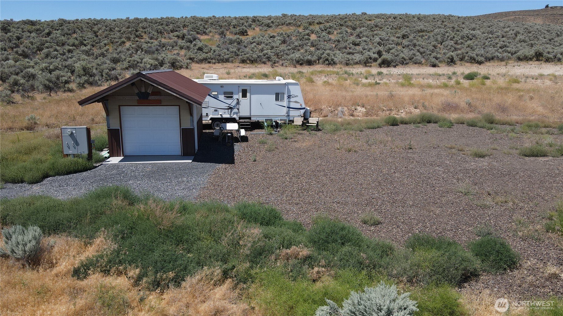 41 Banks Lake View Road, Unit 99115 Coulee City, WA 99115 - Photo 3 of 20 a view of a house with a yard and pathway