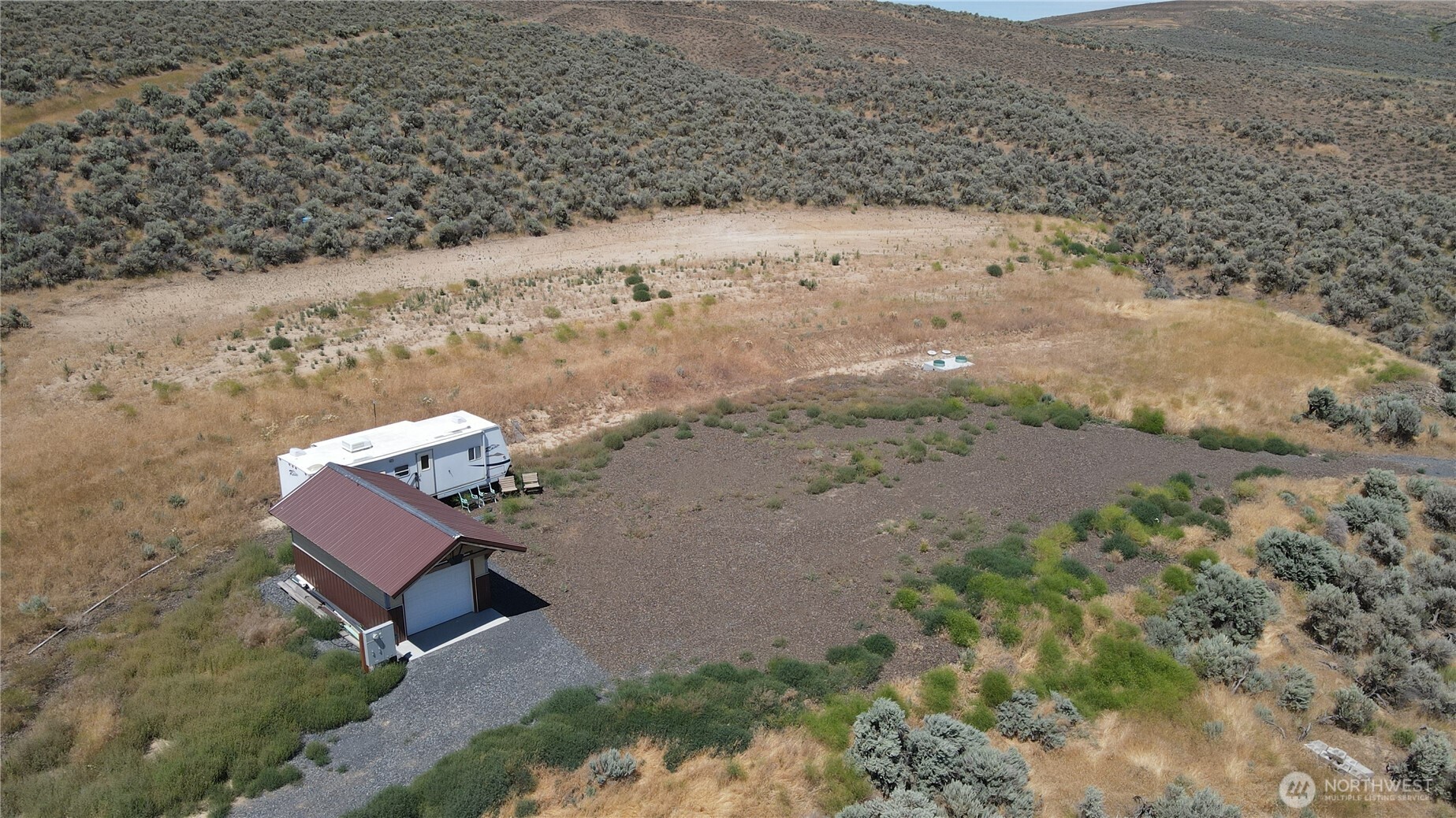 41 Banks Lake View Road, Unit 99115 Coulee City, WA 99115 - Photo 8 of 20 an aerial view of house with a yard