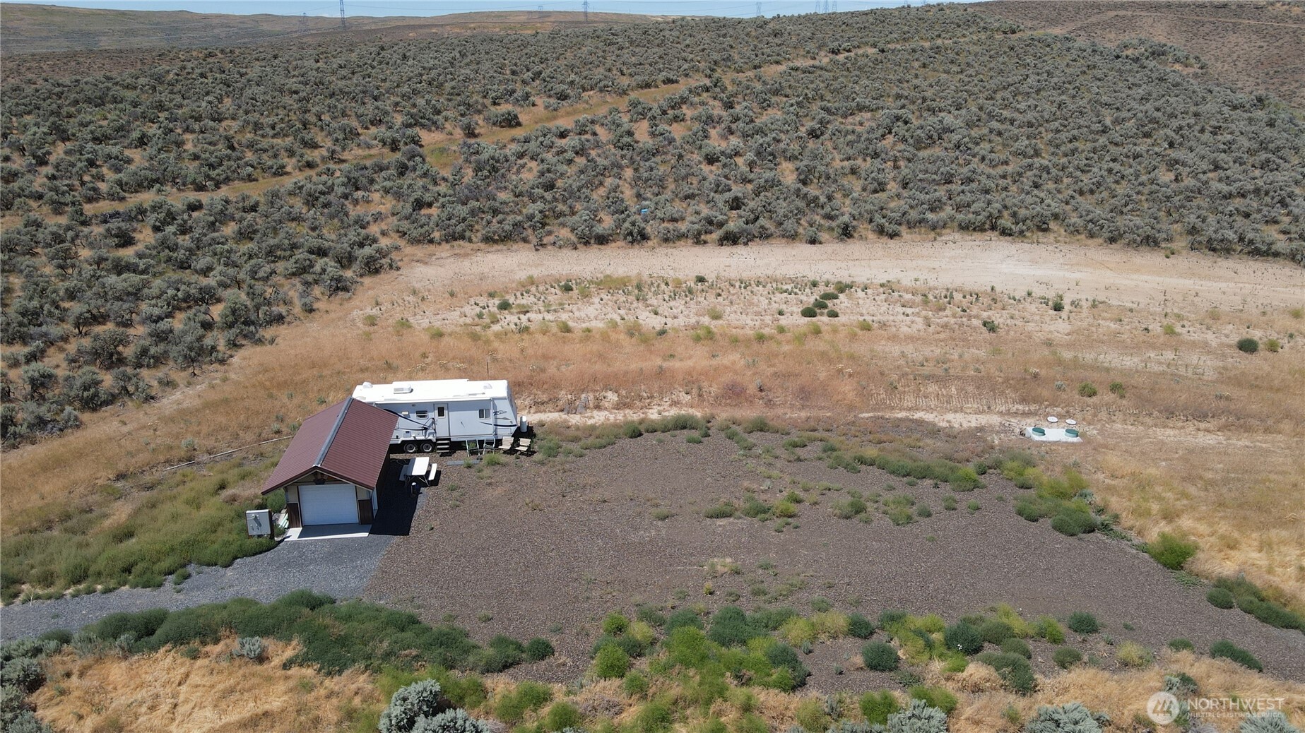 41 Banks Lake View Road, Unit 99115 Coulee City, WA 99115 - Photo 9 of 20 an aerial view of a house with a yard
