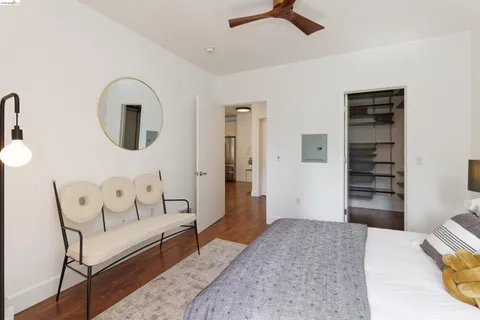 a bedroom with a bed and furniture