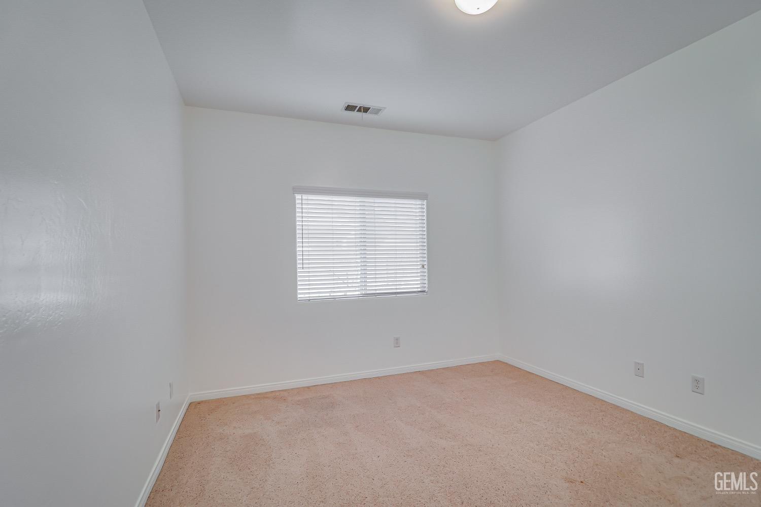Undisclosed Address Bakersfield, CA 93311 - Photo 21 of 31 an empty room with a window