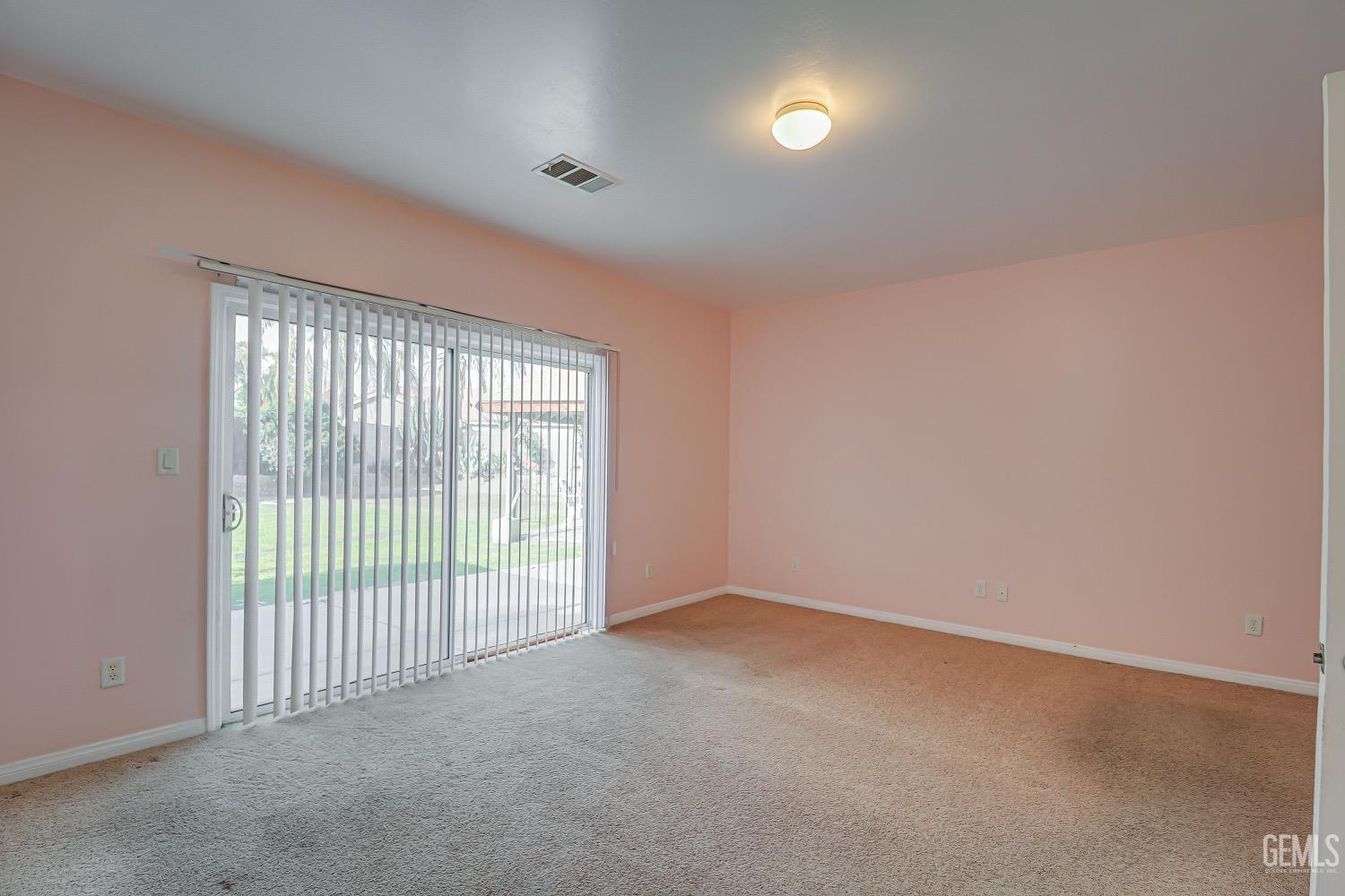 Undisclosed Address Bakersfield, CA 93311 - Photo 24 of 31 a view of an empty room with a window