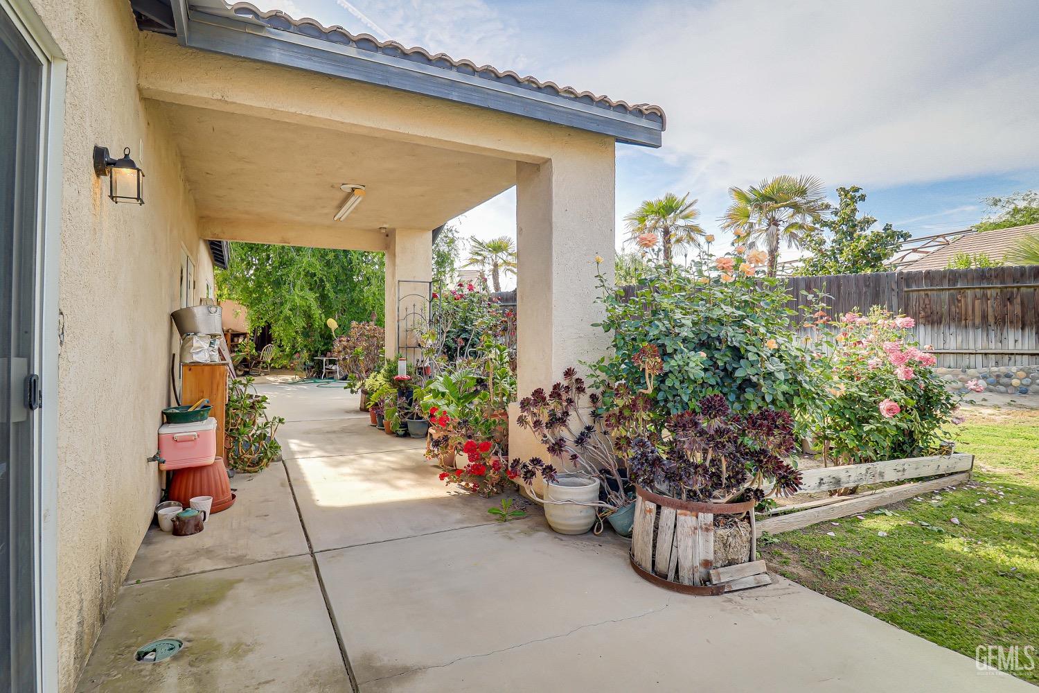 Undisclosed Address Bakersfield, CA 93311 - Photo 28 of 31 a view of a chairs and tables in patio