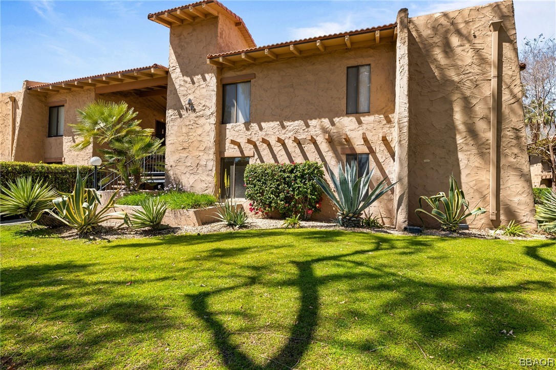 1050 Ramon Road, Unit 8 Palm Springs, CA 92264 - Photo 1 of 31 a view of a back yard of the house