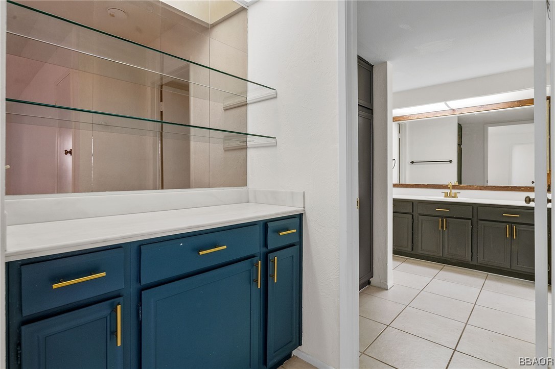 1050 Ramon Road, Unit 8 Palm Springs, CA 92264 - Photo 13 of 31 a kitchen with a sink and cabinets
