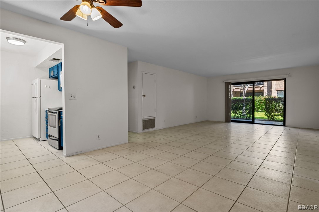 1050 Ramon Road, Unit 8 Palm Springs, CA 92264 - Photo 4 of 31 an empty room with windows