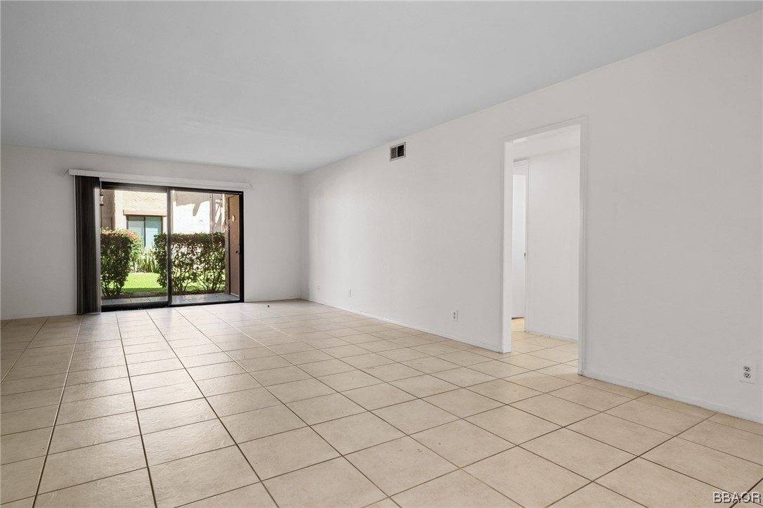 1050 Ramon Road, Unit 8 Palm Springs, CA 92264 - Photo 5 of 31 a view of an empty room and window