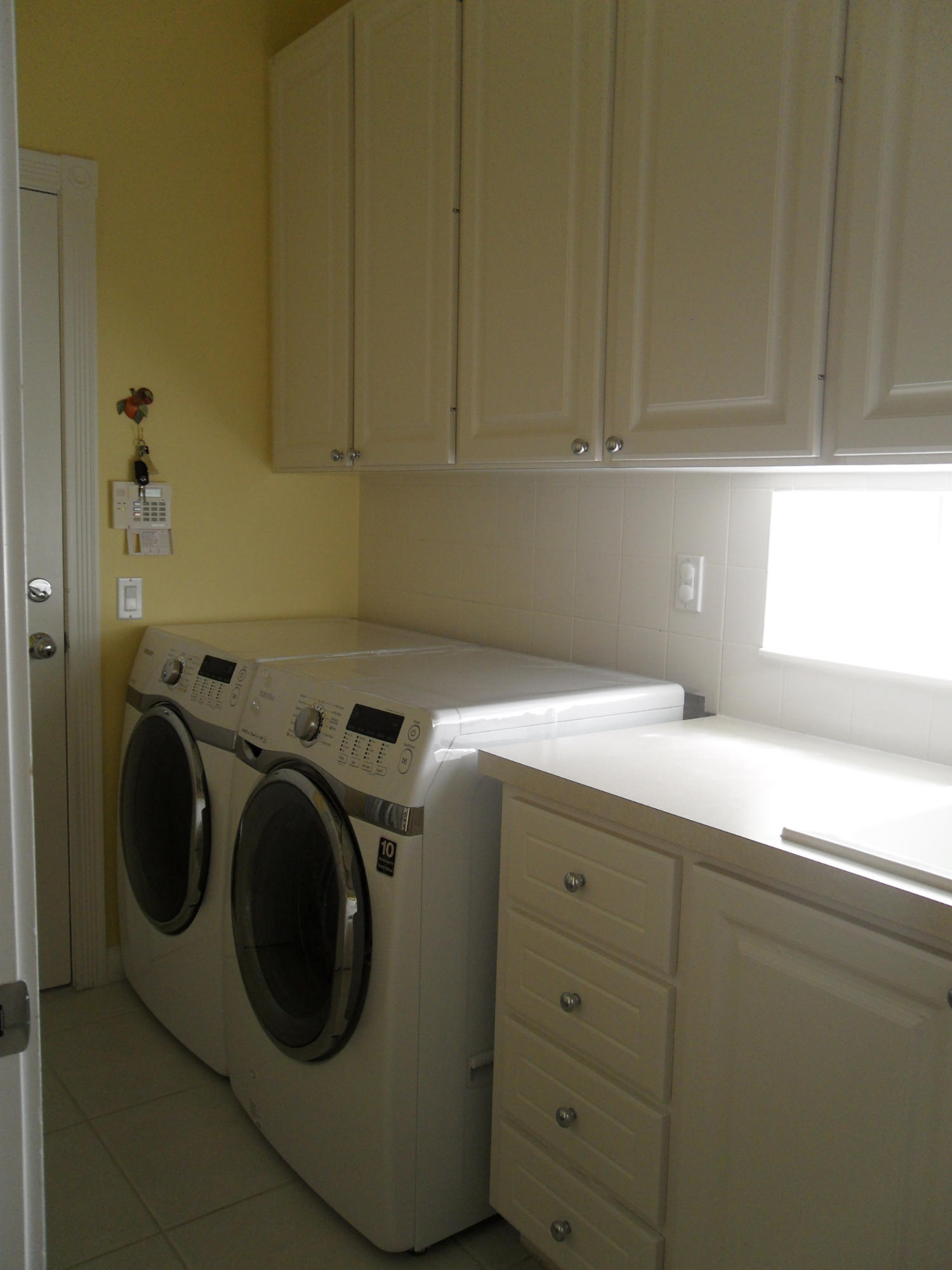 8466 Yorke Road Wellington, FL 33414 - Photo 17 of 36 Laundry Room