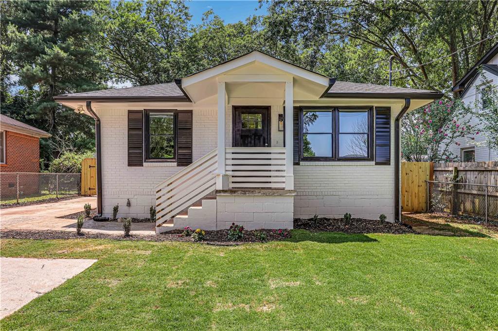 1849 Hooper Street Decatur, GA 30032 - Photo 1 of 1 front view of a house with a yard