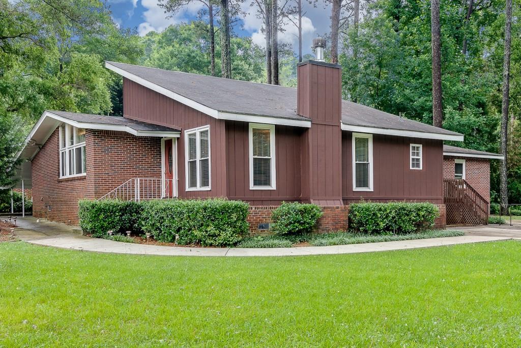 3023 Vine Circle Decatur, GA 30033 - Photo 1 of 1 a front view of a house with a yard
