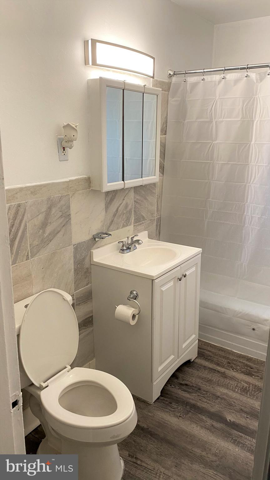 4403 Wakefield Road Baltimore, MD 21216 - Photo 6 of 17 First Floor Full Bathroom!