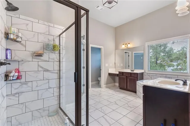 a view of balcony with wooden floor and fence