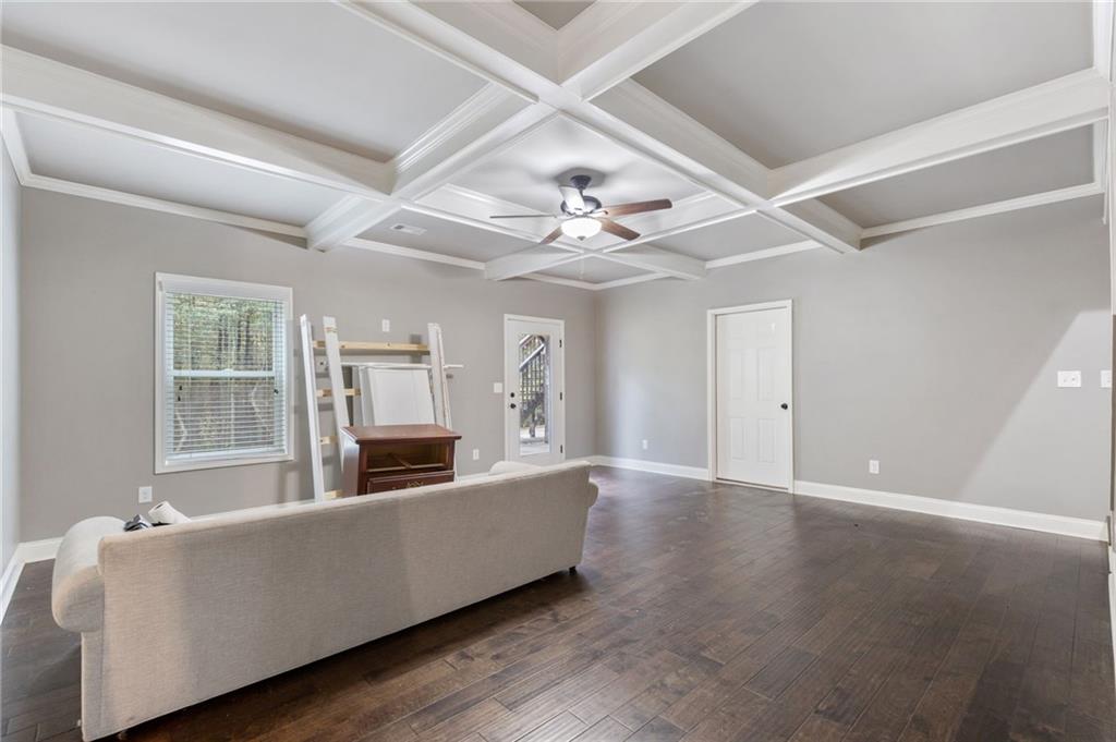 1023 Ruddy Duck Drive Jefferson, GA 30549 - Photo 50 of 69 a living room with furniture and a fireplace