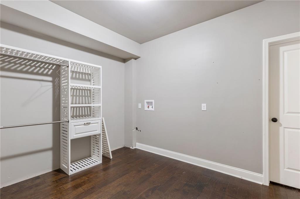 1023 Ruddy Duck Drive Jefferson, GA 30549 - Photo 54 of 69 an empty room with wooden floor and a window