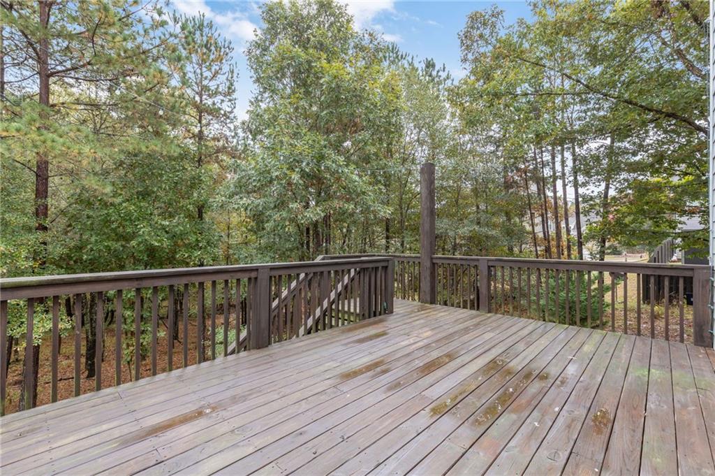 1023 Ruddy Duck Drive Jefferson, GA 30549 - Photo 56 of 69 a view of balcony with wooden floor and fence