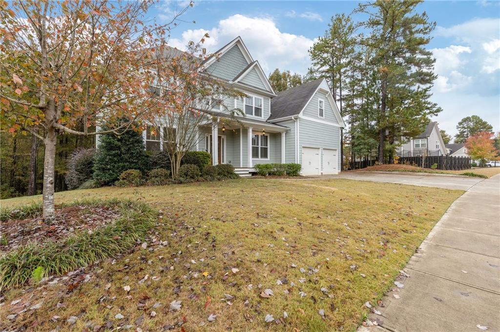 1023 Ruddy Duck Drive Jefferson, GA 30549 - Photo 64 of 69 a front view of a house with a yard