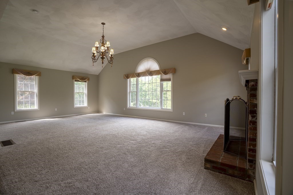 31 Hickory Lane Hudson, MA 01749 - Photo 11 of 40 a view of a room with gym equipment